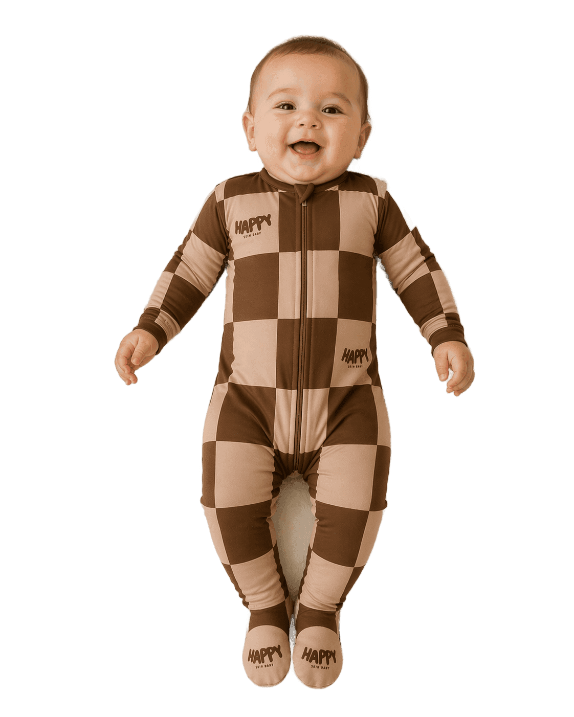 Baby smiling in Happy Skin Baby's Cocoa Cozy brown and tan checker pajama