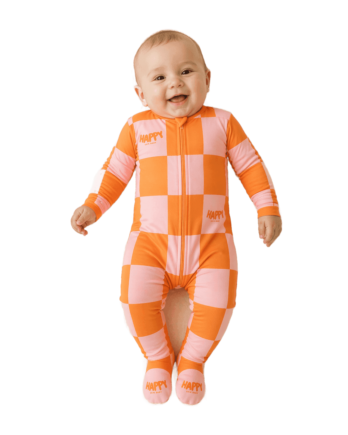 Baby smiling in Happy Skin Baby's Sunset Pop orange and pink checker pajama